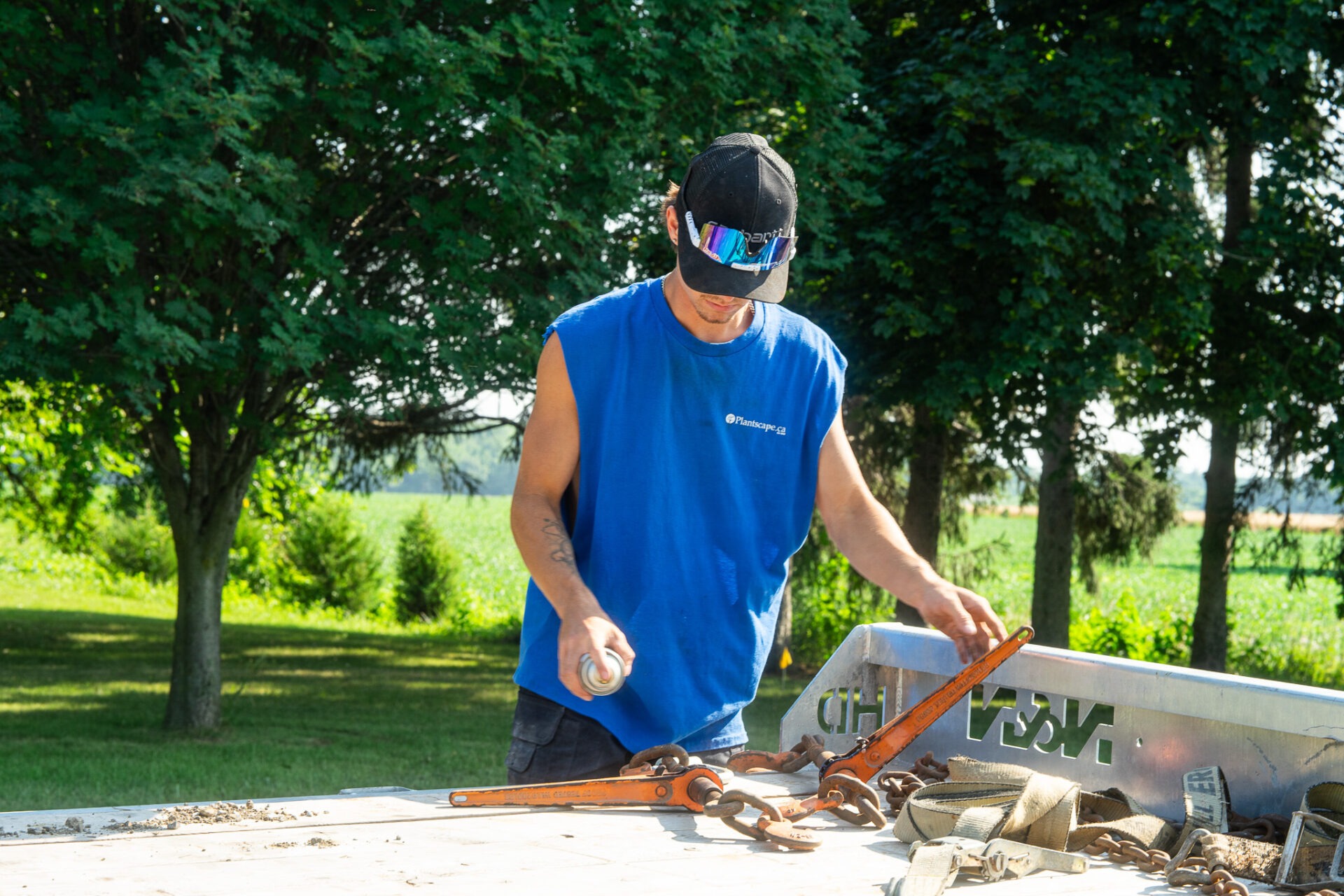 open landscaping truck bed with tools and equipment neatly arranged Windsor Ontario