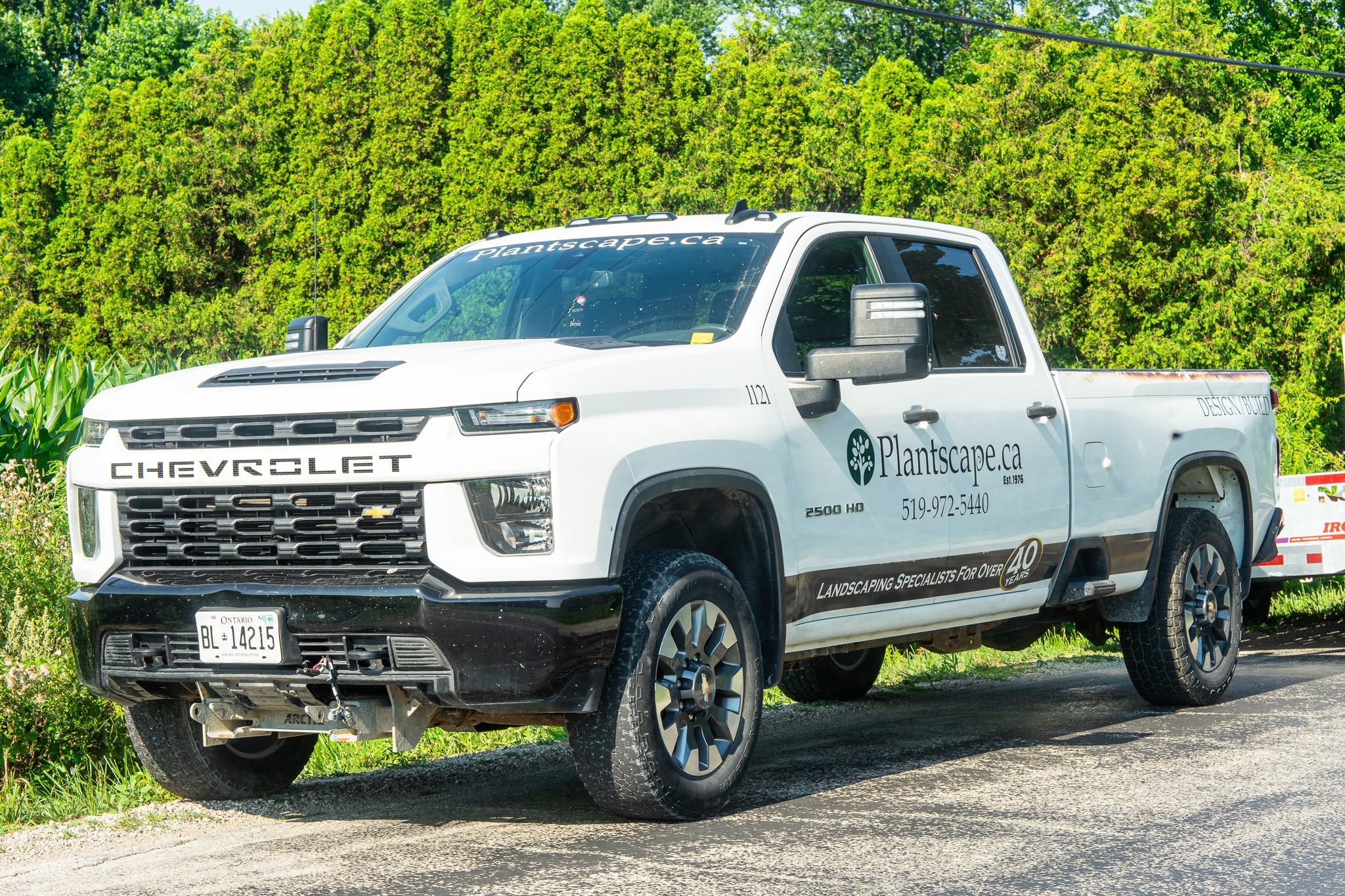 open landscaping truck bed with tools and equipment neatly arranged Windsor Ontario